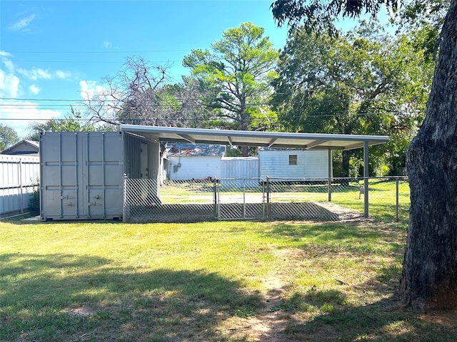 rear view of house featuring a yard