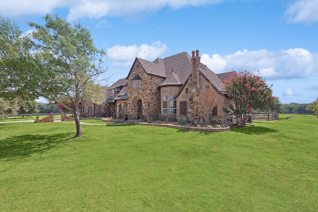 view of property exterior with a lawn