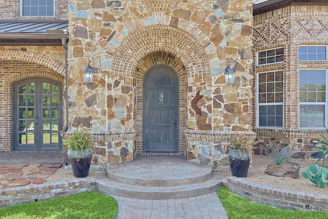 entrance to property featuring french doors