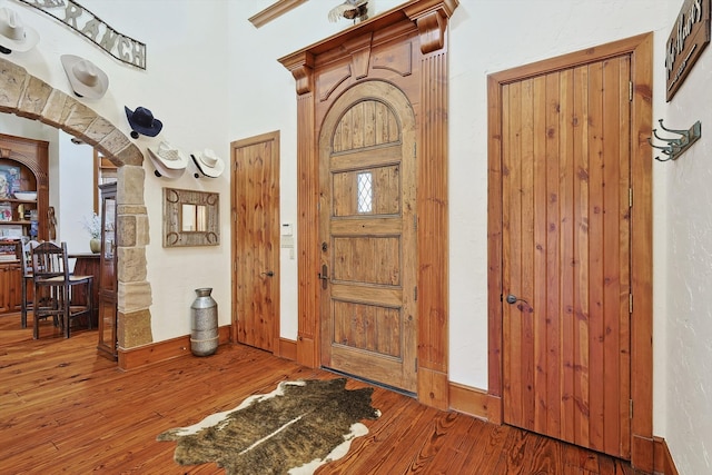 foyer entrance featuring hardwood / wood-style flooring