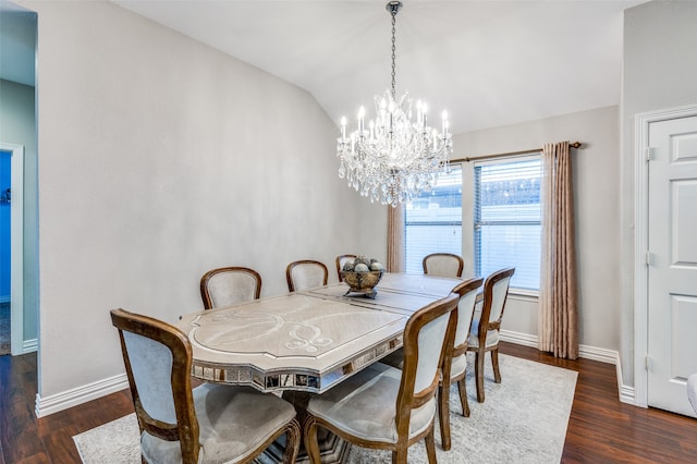 dining room with vaulted ceiling, an inviting chandelier, and dark wood-type flooring