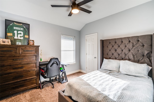 bedroom with carpet floors, vaulted ceiling, and ceiling fan