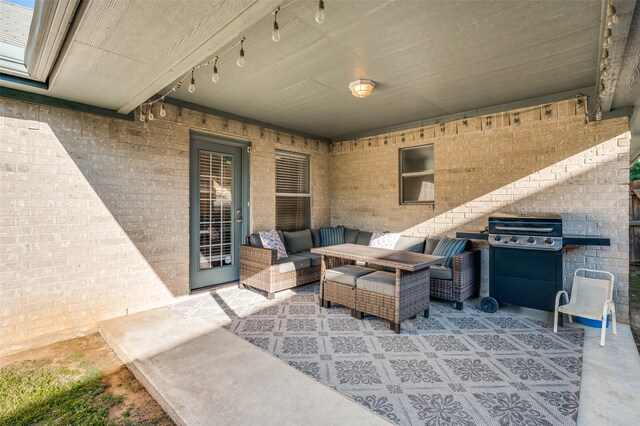 view of patio / terrace featuring grilling area and an outdoor hangout area