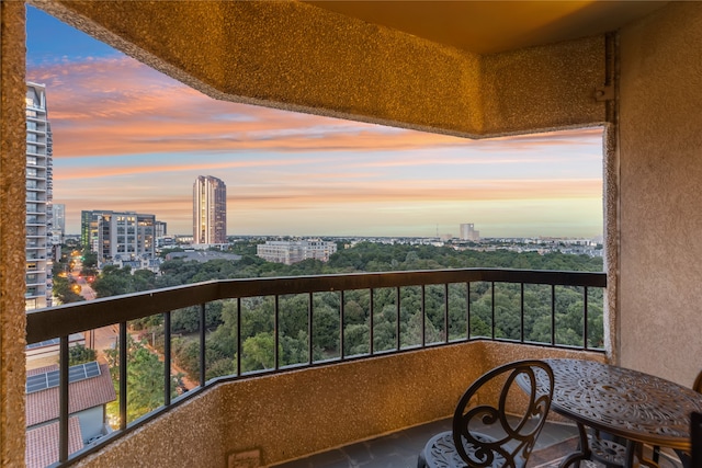 view of balcony at dusk