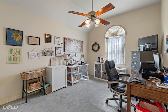 office area with vaulted ceiling, carpet flooring, and ceiling fan