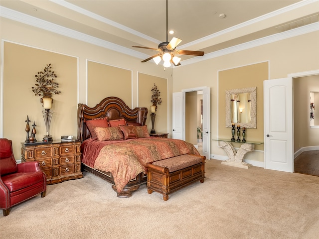 carpeted bedroom with ornamental molding and ceiling fan