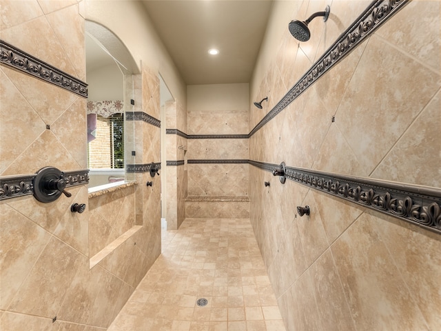 bathroom featuring tiled shower