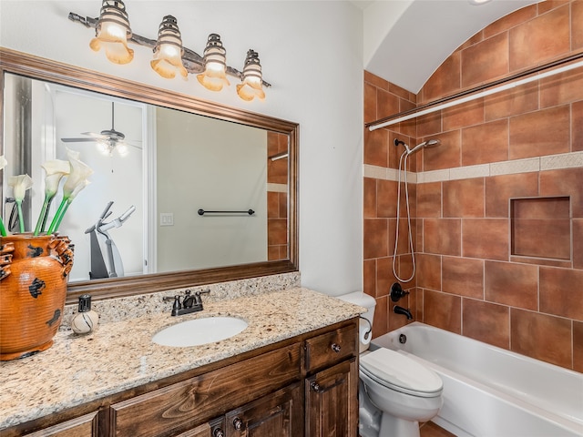 full bathroom featuring vanity, toilet, and tiled shower / bath