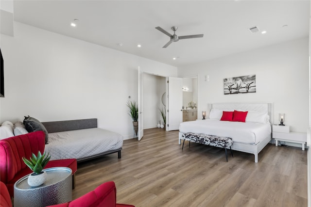 bedroom featuring hardwood / wood-style floors and ceiling fan