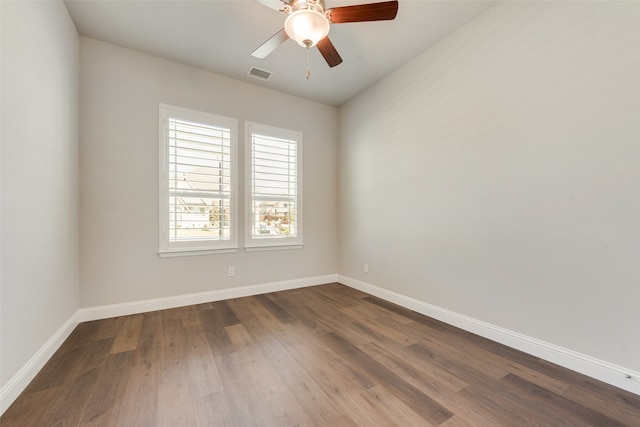 unfurnished room with ceiling fan and hardwood / wood-style floors