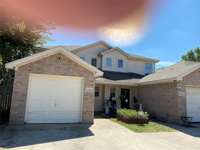 view of front of property featuring a garage