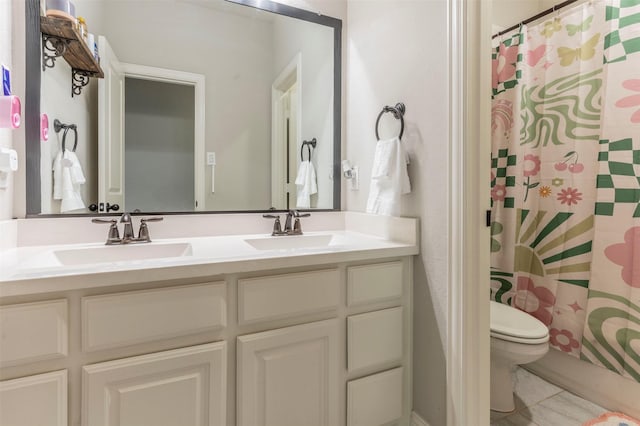 bathroom featuring tile patterned flooring, vanity, a shower with shower curtain, and toilet