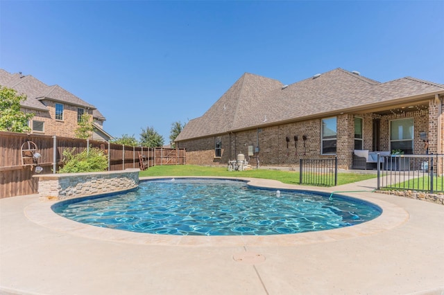 view of swimming pool featuring a patio