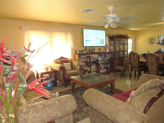 living room featuring ceiling fan