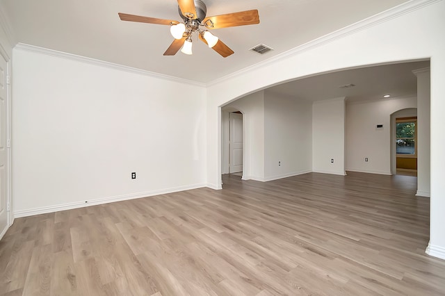 empty room featuring crown molding, ceiling fan, and light hardwood / wood-style flooring