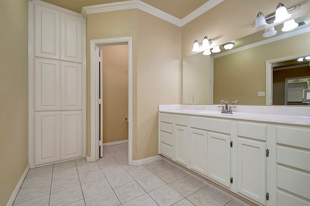 bathroom with vanity, crown molding, and tile patterned floors