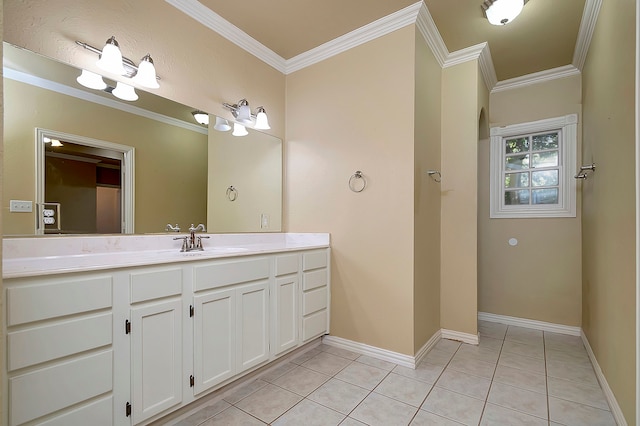 bathroom featuring crown molding, vanity, and tile patterned floors