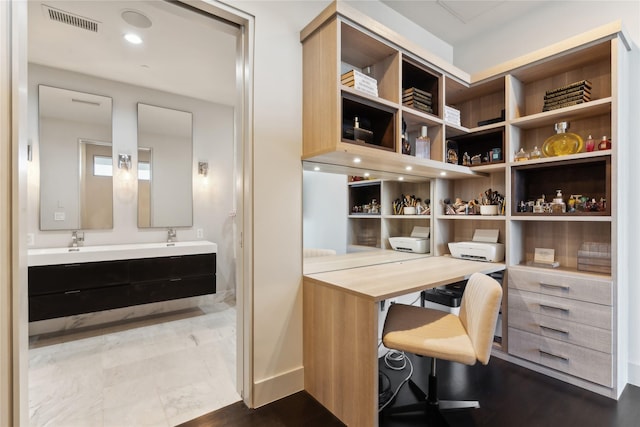 office area with wood-type flooring