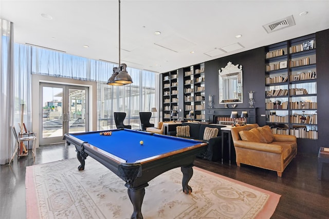 rec room with hardwood / wood-style floors, billiards, and built in features