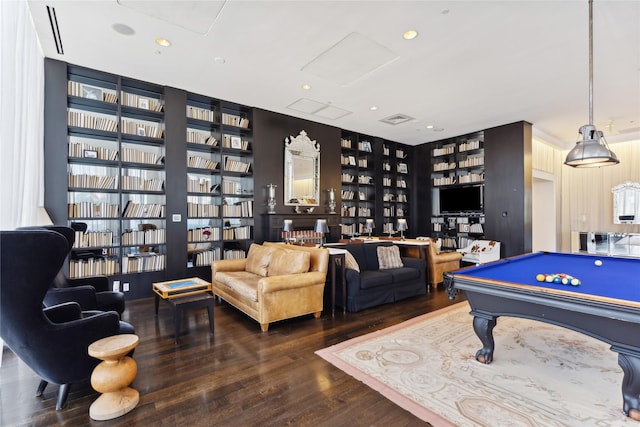 recreation room featuring built in shelves, pool table, and hardwood / wood-style flooring