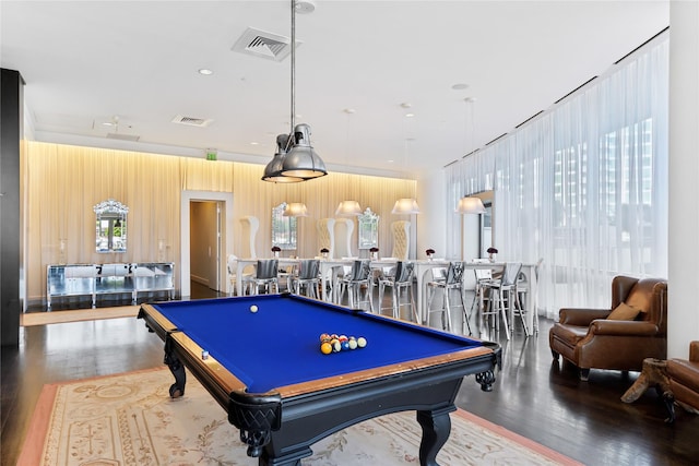 playroom featuring billiards, bar, and hardwood / wood-style flooring