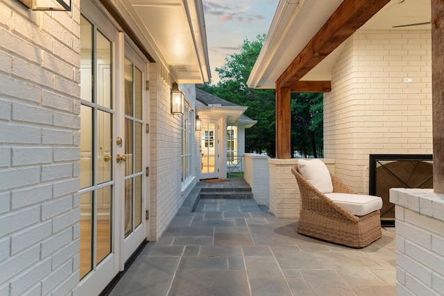 patio terrace at dusk with french doors