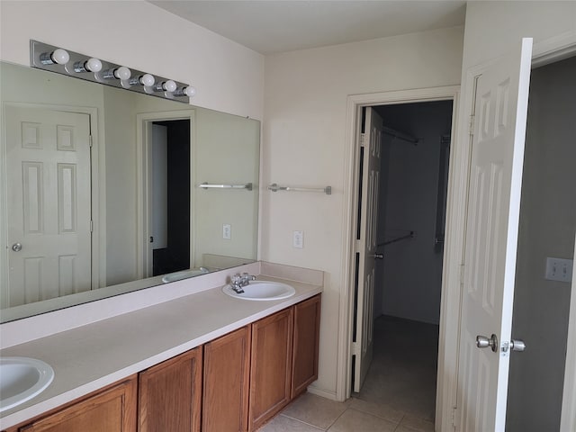 bathroom with vanity and tile patterned floors