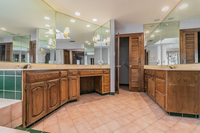 bathroom with vanity and tile patterned flooring