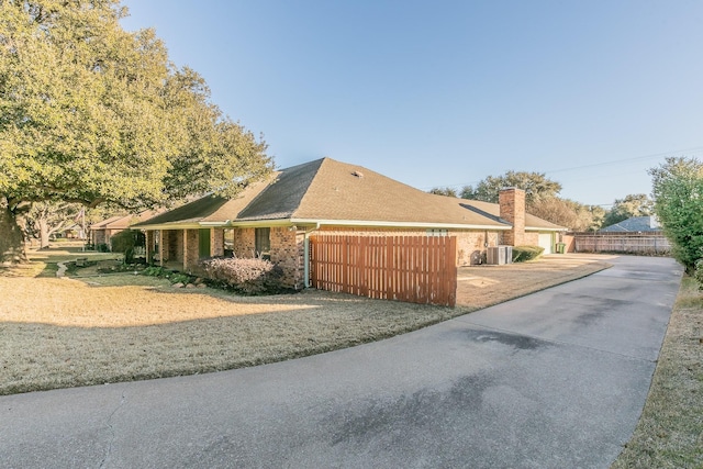 single story home with cooling unit