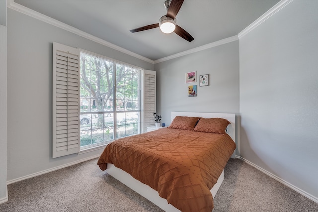 bedroom featuring multiple windows, carpet flooring, and ceiling fan