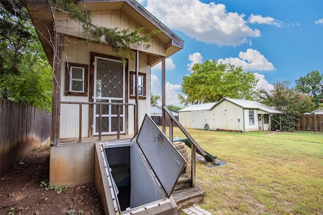 entry to storm shelter with a lawn