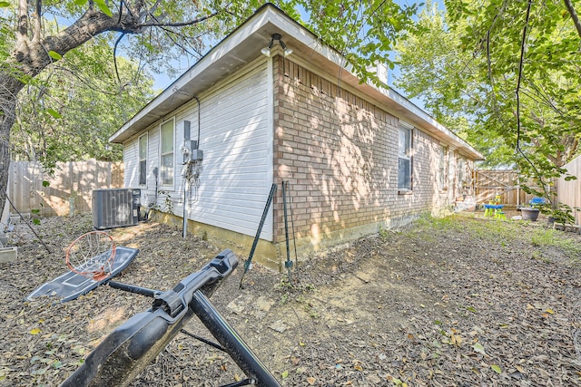 view of side of property featuring cooling unit