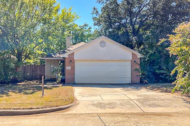 single story home featuring a garage