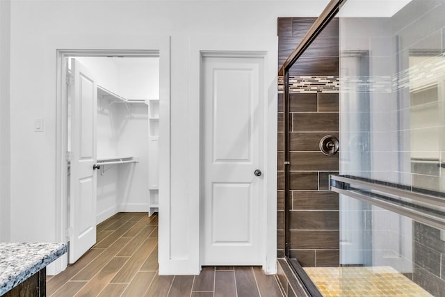 bathroom with an enclosed shower