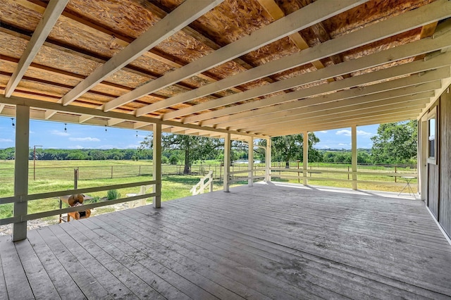 wooden terrace featuring a rural view