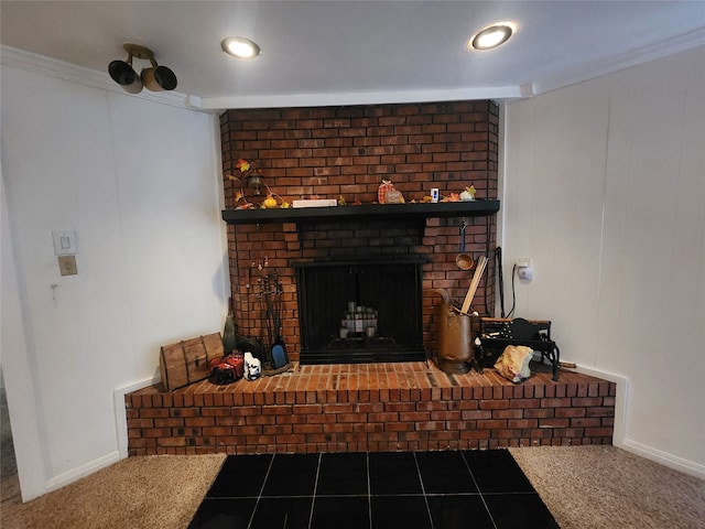 living room featuring a brick fireplace, carpet floors, and ornamental molding