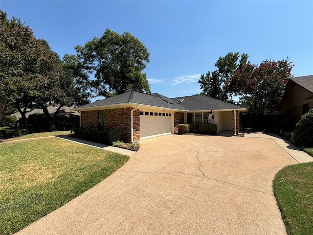 ranch-style home featuring a front yard and a garage