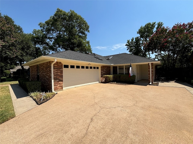 single story home with a garage