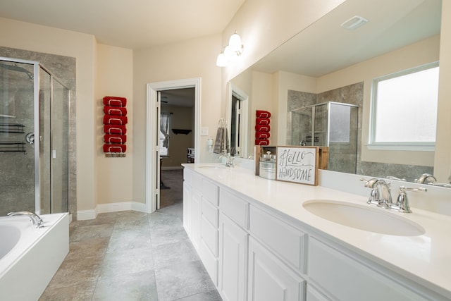 bathroom with vanity, shower with separate bathtub, and tile patterned flooring