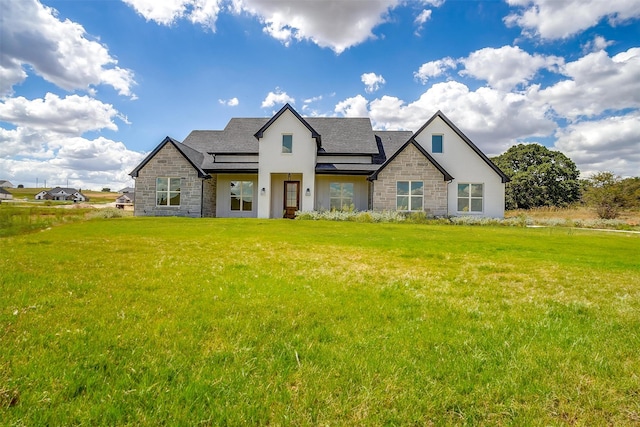 view of front of property with a front lawn