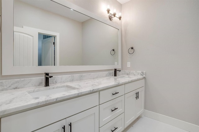 bathroom with vanity and tile patterned flooring