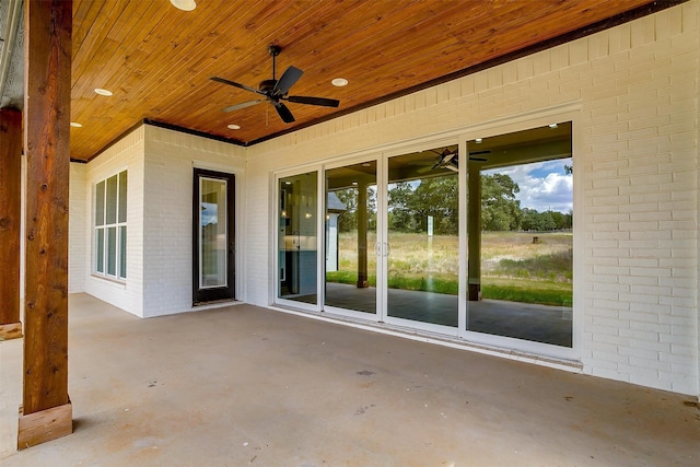 view of patio featuring ceiling fan