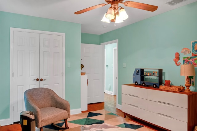 interior space with ceiling fan and light hardwood / wood-style flooring