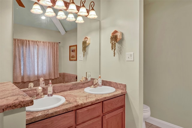 13823 Llano Dr, Weatherford, TX 76087 - bathroom featuring double vanity, tile patterned flooring, and toilet