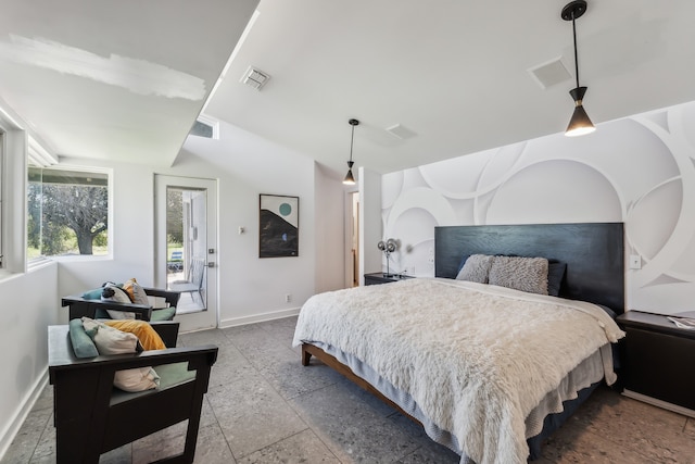 bedroom featuring stone tile floors, visible vents, baseboards, and vaulted ceiling