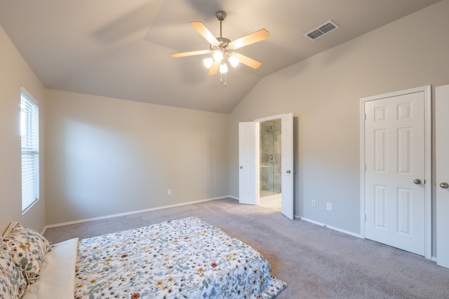 carpeted bedroom featuring ceiling fan and lofted ceiling