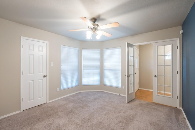 6532 Sierra Madre Dr, Fort Worth, TX 76179 - carpeted spare room with ceiling fan, baseboards, and french doors