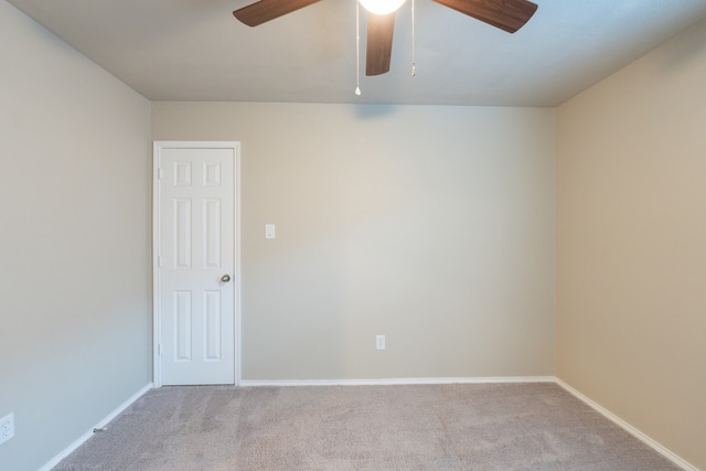 unfurnished room with light carpet and ceiling fan