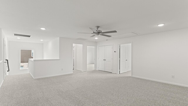 interior space with ceiling fan