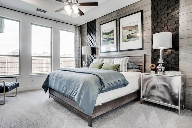 bedroom featuring ceiling fan and carpet floors